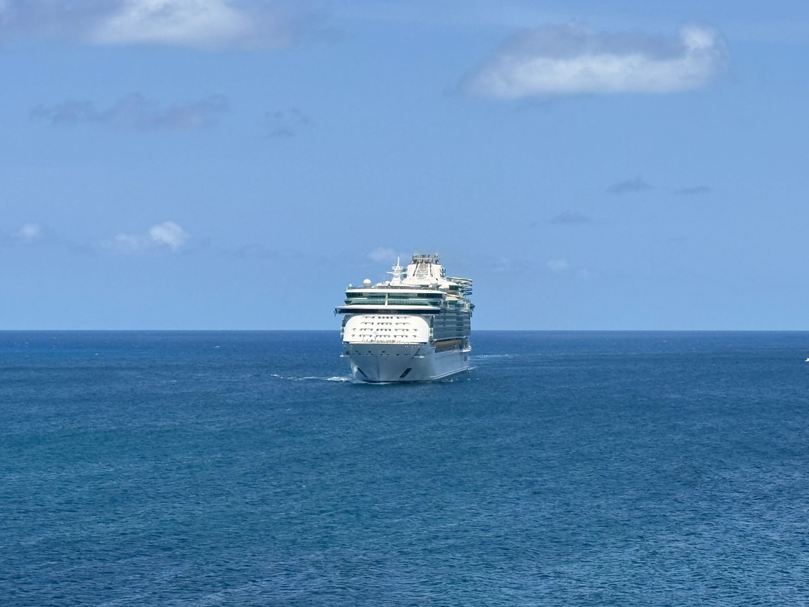 Cruise ship sailing the Caribbean near Sint Maarten, the kind of trip cruise sales promote